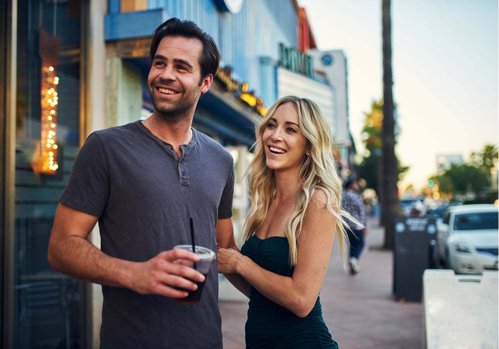 Couple walking in a LA neighborhood.