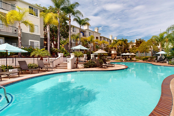 Swimming pool with lounge furniture